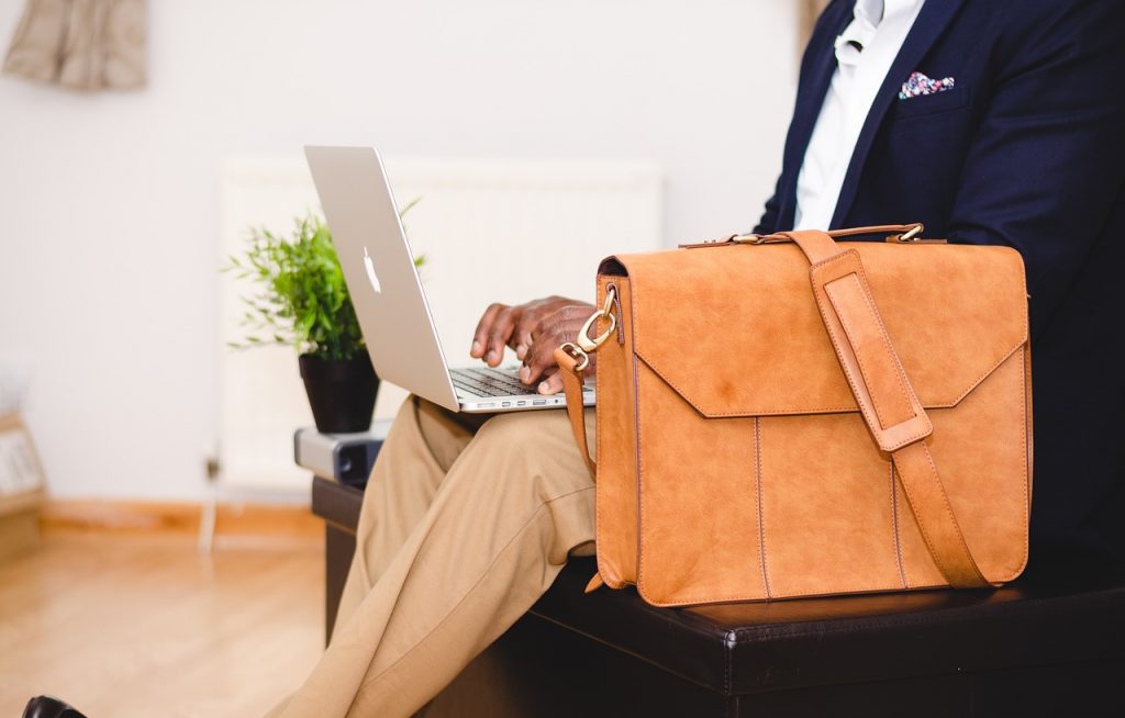 businessman, laptop, bag, chair, computer, indoors, macbook, man, satchel, sit, type, typing, work, working, businessman, businessman, bag, bag, bag, bag, bag, typing